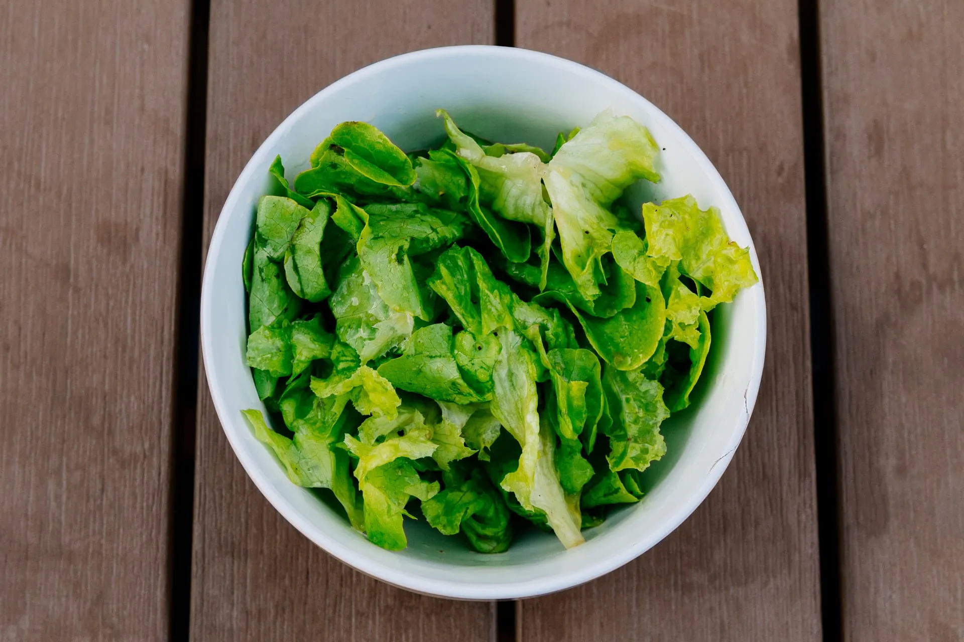 close up of bowl of mixed lettuce
