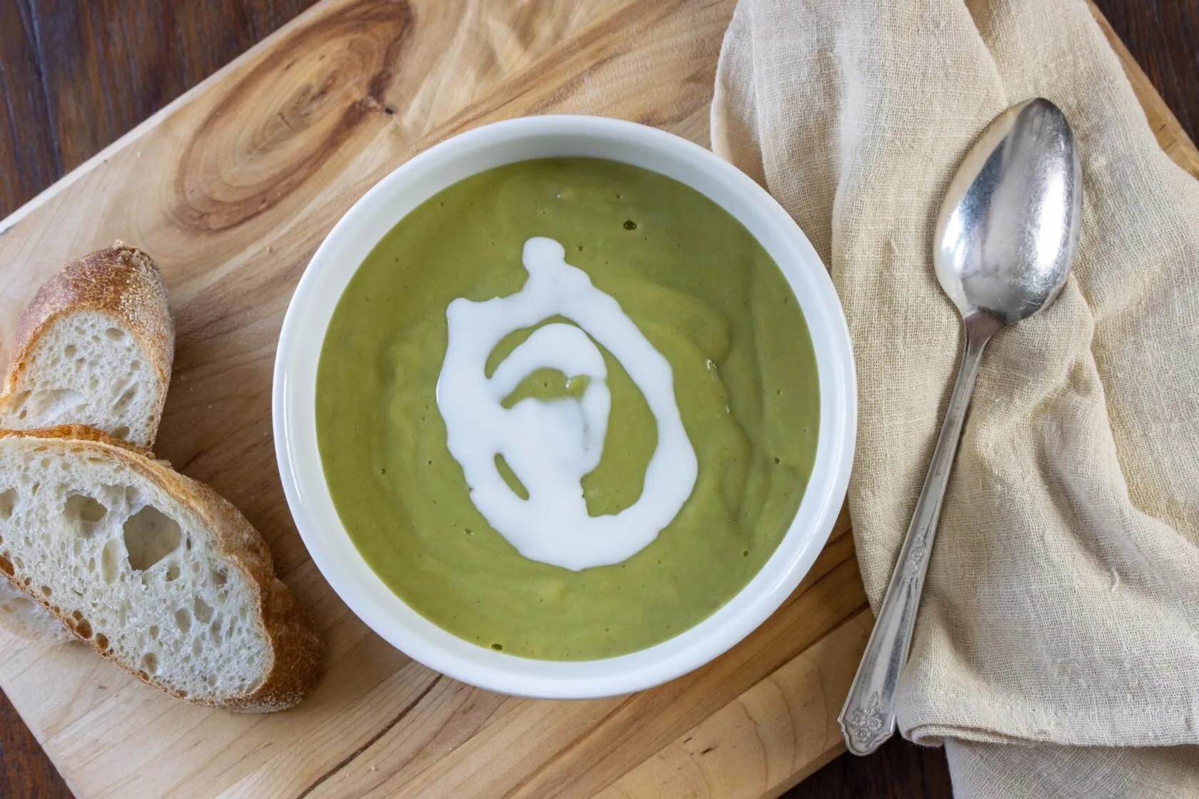 Photo of watercress soup with a side of bread